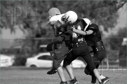 american-football-youth-tackle-359847.jpg